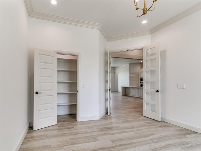 2263 Winter Creek Blvd, Blanchard, OK 73010 - unfurnished bedroom featuring crown molding, light wood-style flooring, a chandelier, and recessed lighting