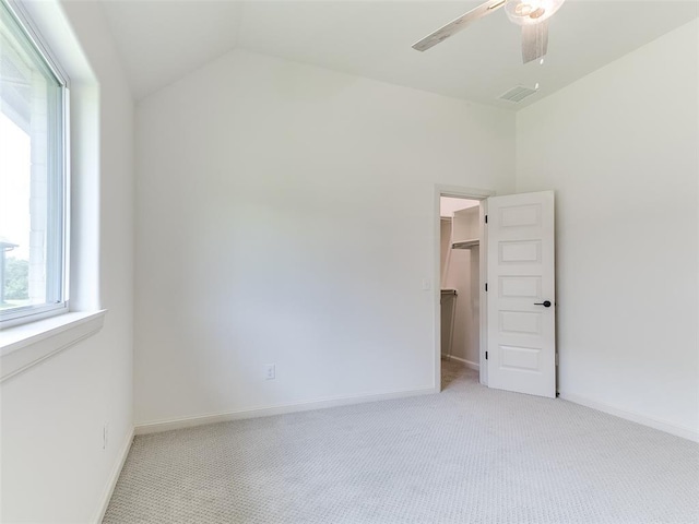 2263 Winter Creek Blvd, Blanchard, OK 73010 - spare room with light colored carpet, a ceiling fan, and lofted ceiling