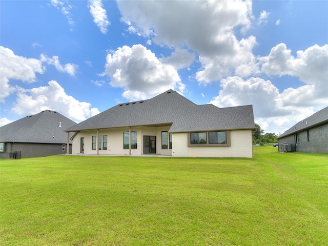 2263 Winter Creek Blvd, Blanchard, OK 73010 - rear view of house featuring a yard and a shingled roof