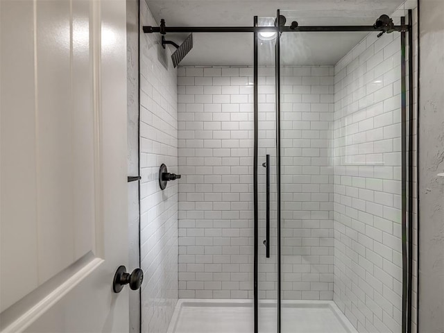 313 Ember Glow Dr, Moore, OK 73160 - bathroom featuring a stall shower