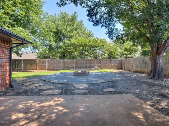 313 Ember Glow Dr, Moore, OK 73160 - view of pool with a fenced backyard, a patio area, and an outdoor fire pit