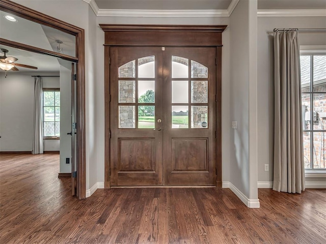 1233 Autumn Creek Dr, Edmond, OK 73003 - foyer with dark wood-type flooring, ornamental molding, a ceiling fan, and french doors