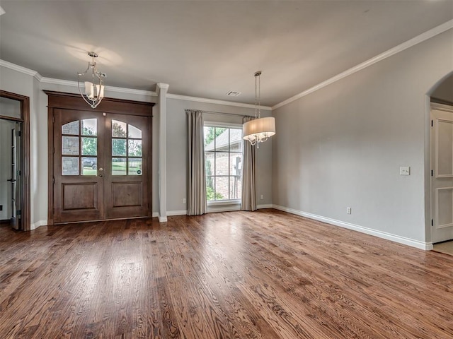 1233 Autumn Creek Dr, Edmond, OK 73003 - foyer featuring a chandelier, wood finished floors, french doors, and ornamental molding