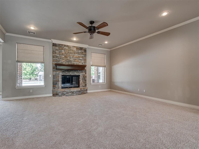 1233 Autumn Creek Dr, Edmond, OK 73003 - unfurnished living room featuring ceiling fan, crown molding, a fireplace, carpet flooring, and recessed lighting