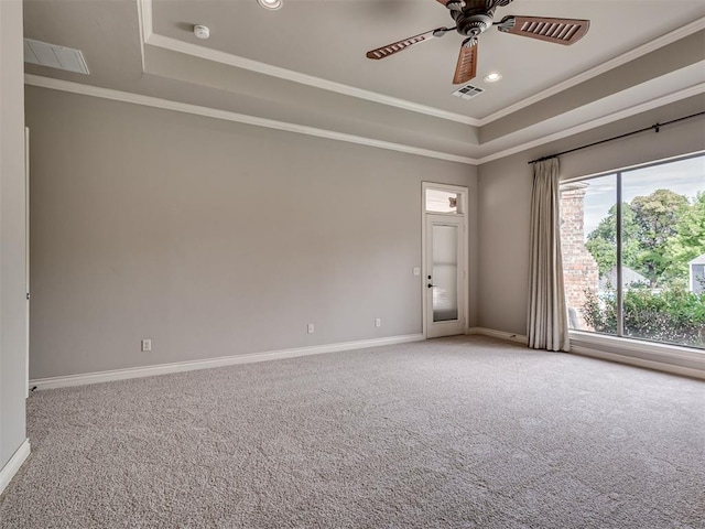 1233 Autumn Creek Dr, Edmond, OK 73003 - carpeted empty room with a tray ceiling, ornamental molding, a ceiling fan, recessed lighting, and a smoke detector