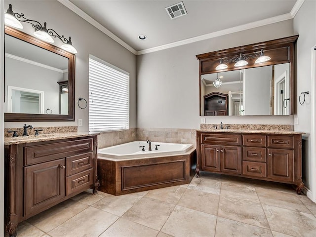 1233 Autumn Creek Dr, Edmond, OK 73003 - full bathroom featuring two vanities, a garden tub, and ornamental molding