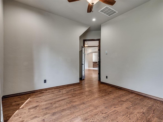 1233 Autumn Creek Dr, Edmond, OK 73003 - spare room featuring ceiling fan, wood finished floors, and recessed lighting