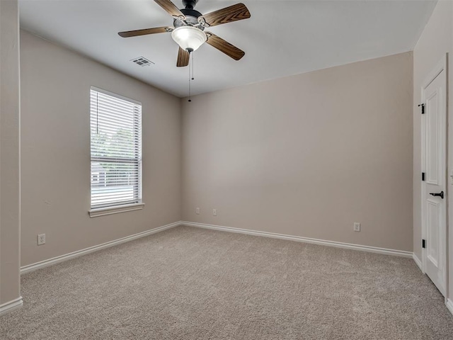 1233 Autumn Creek Dr, Edmond, OK 73003 - carpeted empty room with baseboards and a ceiling fan