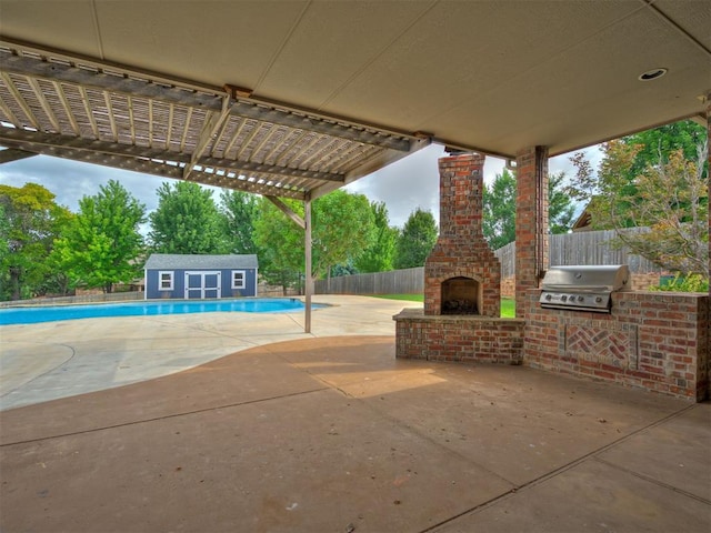 1233 Autumn Creek Dr, Edmond, OK 73003 - view of patio with an outdoor brick fireplace, exterior kitchen, and a pergola