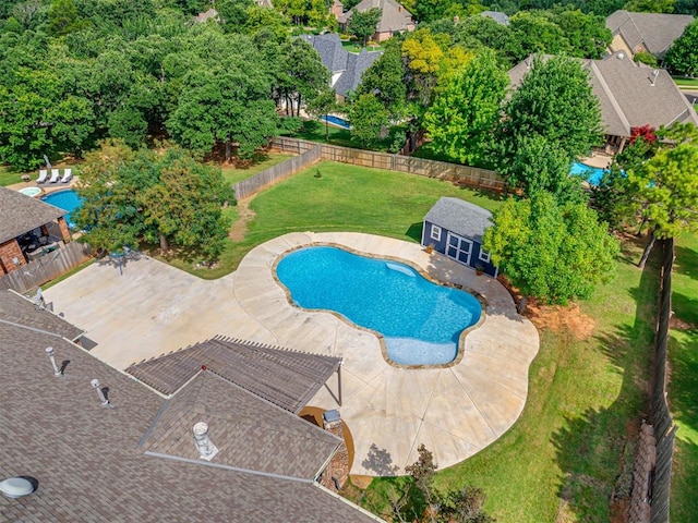1233 Autumn Creek Dr, Edmond, OK 73003 - view of swimming pool featuring an outbuilding and a patio area