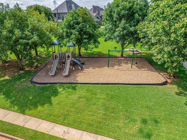 1233 Autumn Creek Dr, Edmond, OK 73003 - community play area featuring a lawn