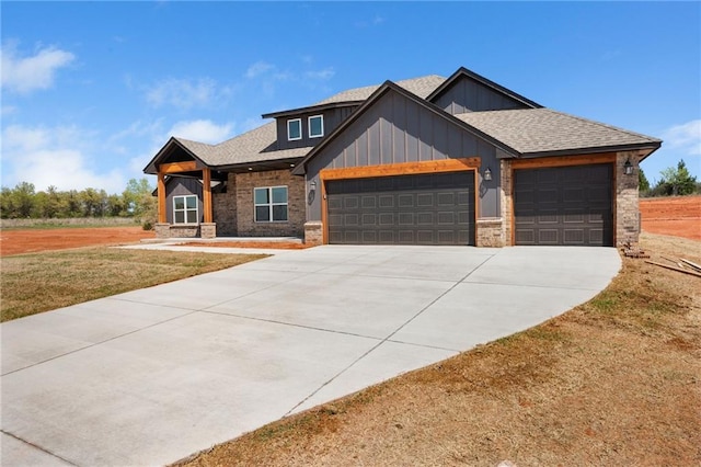 2344 Knox Ln, Blanchard, OK 73010 - view of front of home featuring an attached garage, board and batten siding, driveway, a front lawn, and a shingled roof