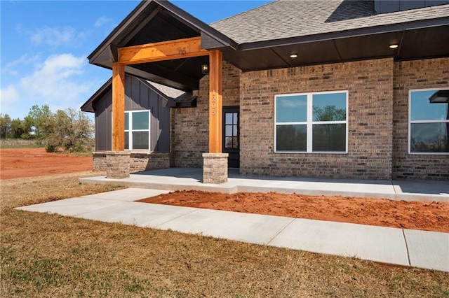 2344 Knox Ln, Blanchard, OK 73010 - view of front facade with brick siding and a shingled roof