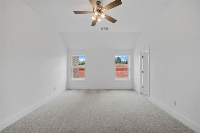 2344 Knox Ln, Blanchard, OK 73010 - carpeted spare room featuring vaulted ceiling and a ceiling fan