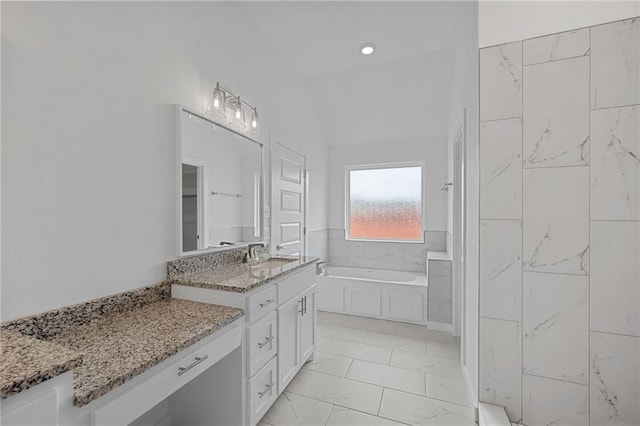 2344 Knox Ln, Blanchard, OK 73010 - bathroom featuring a bath, vanity, vaulted ceiling, and marble finish floors