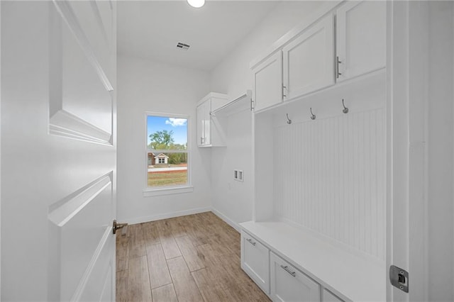 2344 Knox Ln, Blanchard, OK 73010 - mudroom with light wood-style floors and baseboards