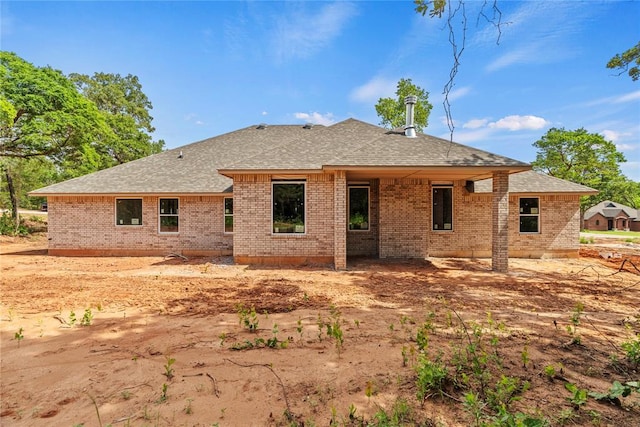 2344 Knox Ln, Blanchard, OK 73010 - back of house with roof with shingles and brick siding