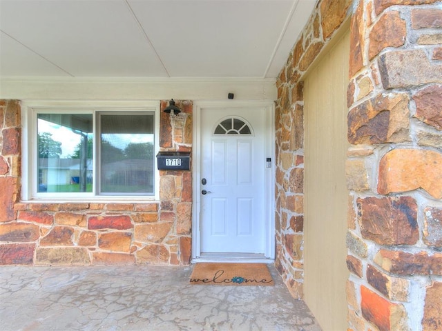 1710 Carlisle Rd, Oklahoma City, OK 73120 - doorway to property with stone siding