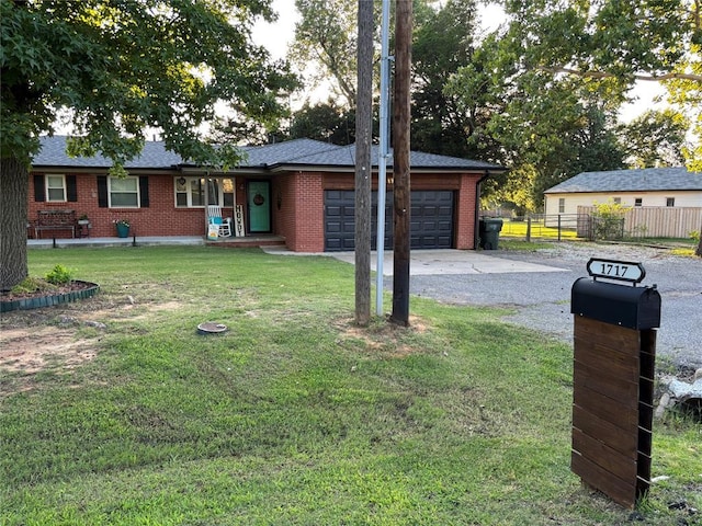 1717 S Webster Dr, Midwest City, OK 73130 - ranch-style home featuring driveway, a garage, and brick siding