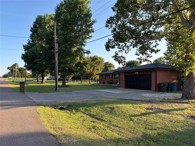1717 S Webster Dr, Midwest City, OK 73130 - garage with asphalt driveway