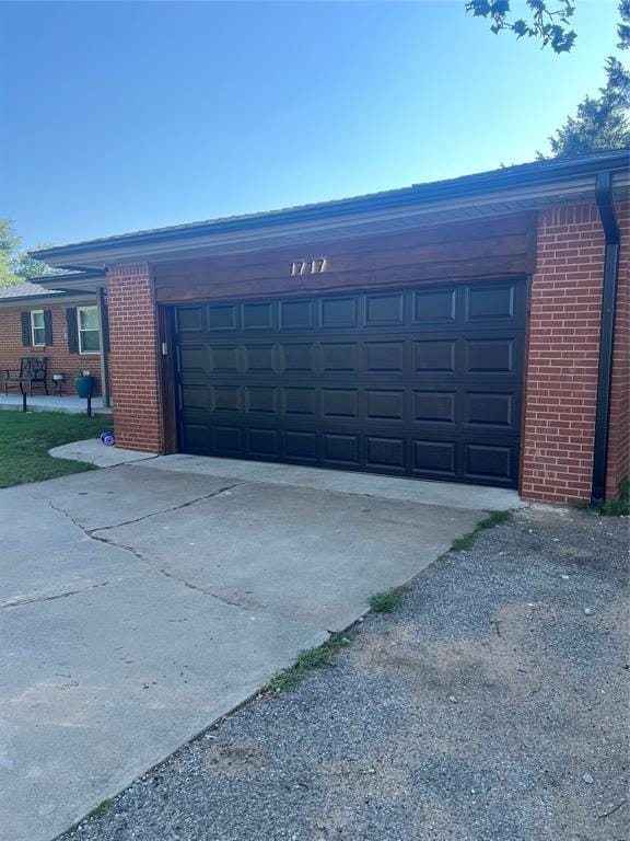 1717 S Webster Dr, Midwest City, OK 73130 - garage with driveway