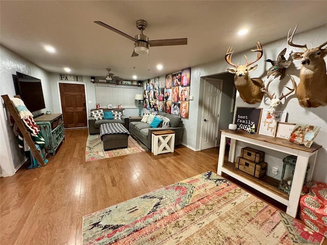 1717 S Webster Dr, Midwest City, OK 73130 - living area with wood finished floors, ceiling fan, and recessed lighting