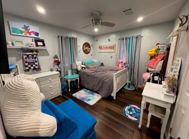 1717 S Webster Dr, Midwest City, OK 73130 - bedroom with wood finished floors, a ceiling fan, and recessed lighting