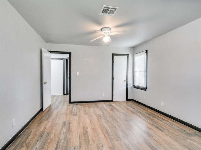 3225 SE 20th St, Oklahoma City, OK 73115 - unfurnished bedroom featuring wood finished floors and ceiling fan