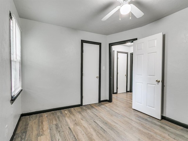 3225 SE 20th St, Oklahoma City, OK 73115 - unfurnished bedroom featuring light wood finished floors and a ceiling fan