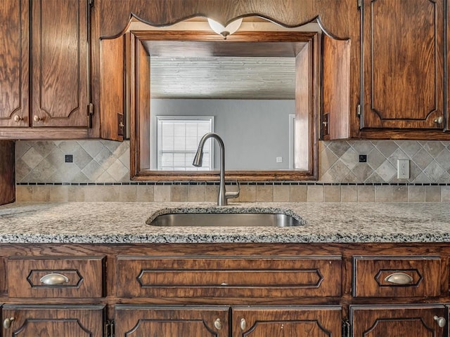201 N Base Ave, Norman, OK 73069 - kitchen with tasteful backsplash and light stone countertops