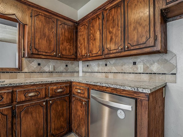 201 N Base Ave, Norman, OK 73069 - kitchen featuring stainless steel dishwasher, tasteful backsplash, and light countertops