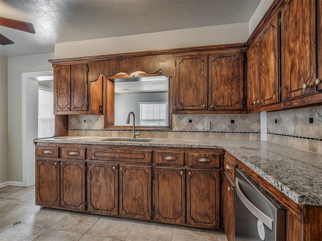 201 N Base Ave, Norman, OK 73069 - kitchen featuring dishwasher, plenty of natural light, ceiling fan, and backsplash