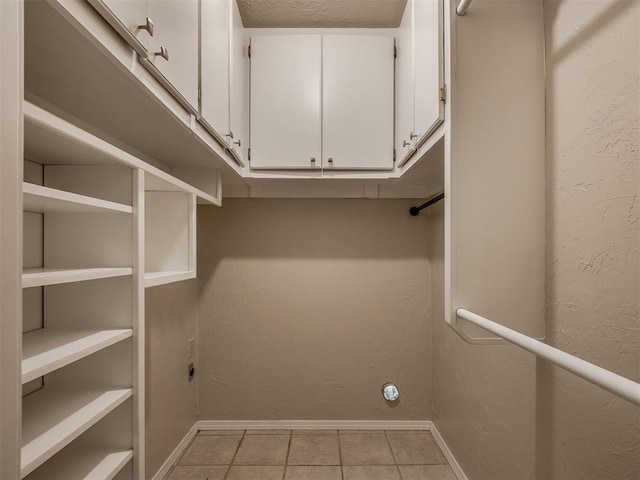 201 N Base Ave, Norman, OK 73069 - spacious closet with light tile patterned floors
