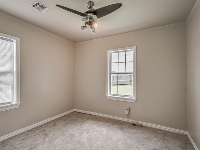 201 N Base Ave, Norman, OK 73069 - carpeted empty room with ceiling fan and ornamental molding