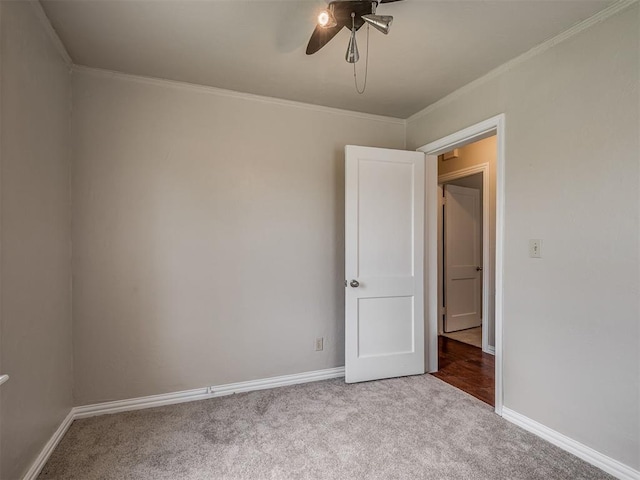 201 N Base Ave, Norman, OK 73069 - unfurnished room with carpet floors, ornamental molding, and ceiling fan