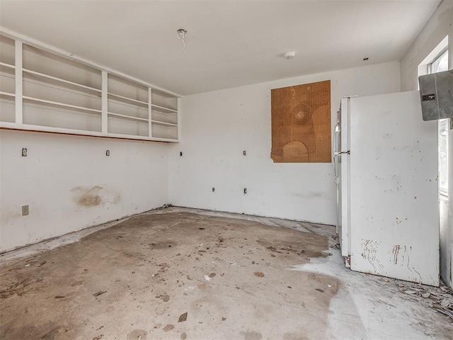 201 N Base Ave, Norman, OK 73069 - garage featuring freestanding refrigerator
