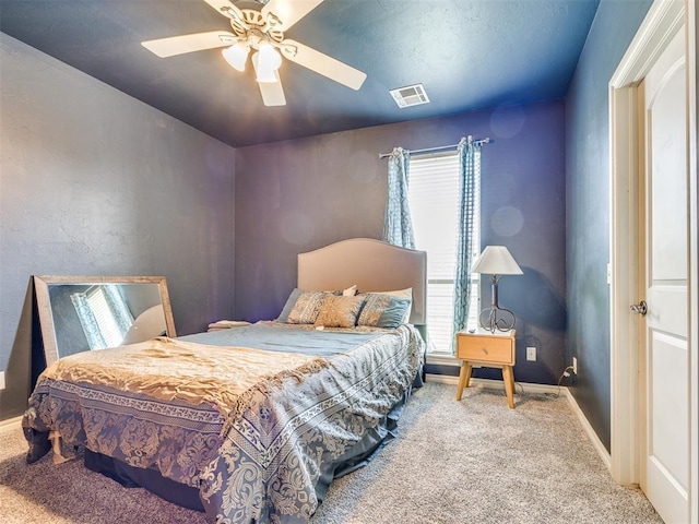 1621 NW 182nd St, Edmond, OK 73012 - carpeted bedroom with multiple windows and a ceiling fan