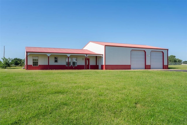 27919 Tortola Ln, Blanchard, OK 73010 - view of front of property featuring a front lawn and a garage