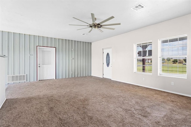 27919 Tortola Ln, Blanchard, OK 73010 - unfurnished living room featuring carpet floors and ceiling fan