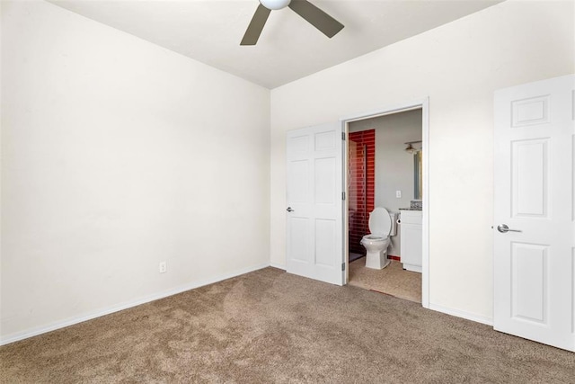 27919 Tortola Ln, Blanchard, OK 73010 - unfurnished bedroom featuring carpet floors, ensuite bathroom, and a ceiling fan