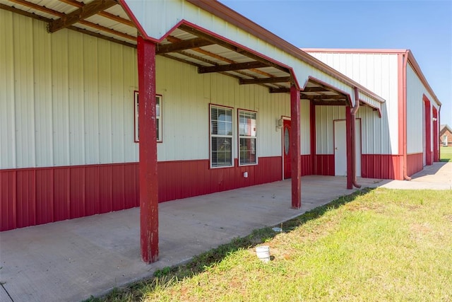 27919 Tortola Ln, Blanchard, OK 73010 - view of side of home with a patio area and a lawn