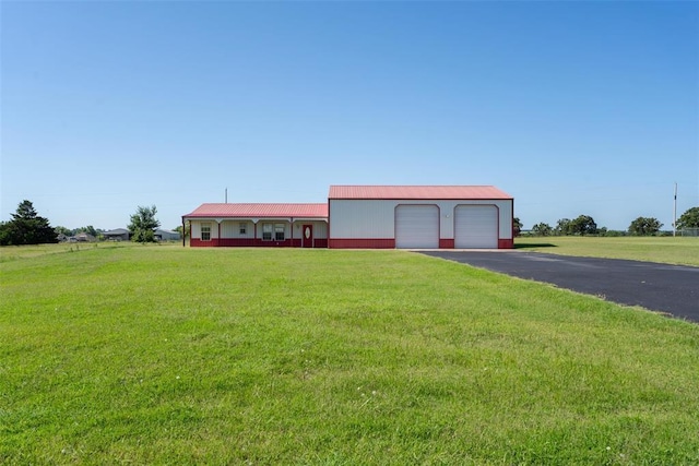 27919 Tortola Ln, Blanchard, OK 73010 - ranch-style house featuring a detached garage and a front lawn
