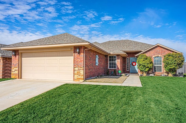 1613 NW 124th St, Oklahoma City, OK 73120 - ranch-style home with concrete driveway, an attached garage, a front lawn, and a shingled roof