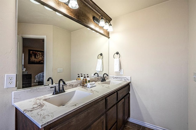 1613 NW 124th St, Oklahoma City, OK 73120 - ensuite bathroom with double vanity and tile patterned flooring