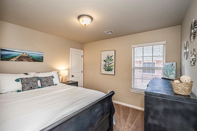 1613 NW 124th St, Oklahoma City, OK 73120 - bedroom featuring dark carpet and baseboards