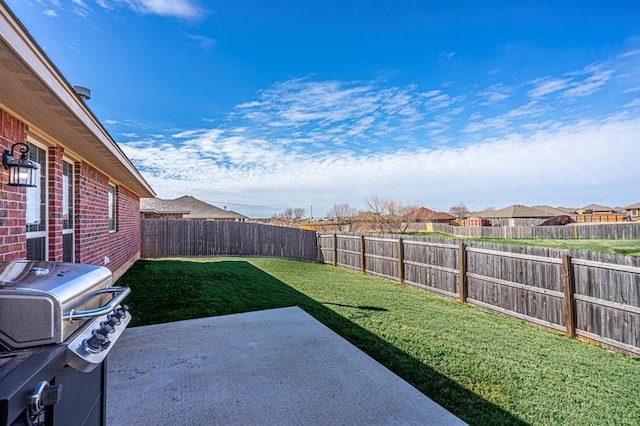 1613 NW 124th St, Oklahoma City, OK 73120 - fenced backyard with a patio and a residential view