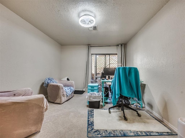14313 N Pennsylvania Ave Unit 7E, Oklahoma City, OK 73134 - office area featuring a textured ceiling, a textured wall, and carpet floors