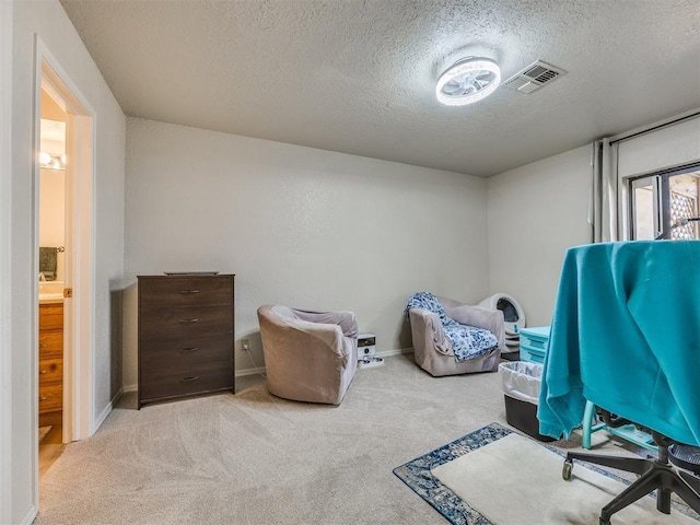 14313 N Pennsylvania Ave Unit 7E, Oklahoma City, OK 73134 - bedroom with a textured ceiling and carpet floors