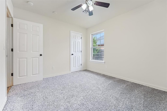 9716 SW 21st Ter, Oklahoma City, OK 73128 - unfurnished bedroom featuring light colored carpet and a ceiling fan