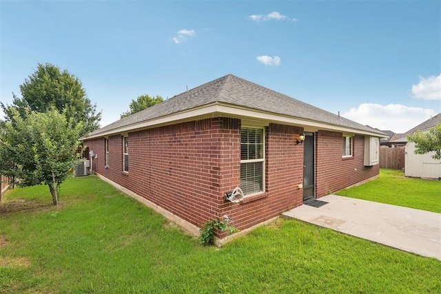 9716 SW 21st Ter, Oklahoma City, OK 73128 - view of side of property featuring brick siding and a central air condition unit